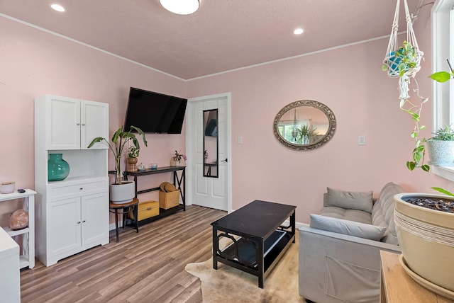 3209 N Bessie Rd, Millwood, WA 99212 - living room with light wood-type flooring, recessed lighting, and crown molding