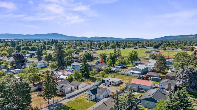 3209 N Bessie Rd, Millwood, WA 99212 - aerial perspective of suburban area with a mountain backdrop