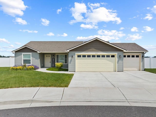 818 S Apple Pl, Spokane, WA 99224 - single story home featuring an attached garage, driveway, and roof with shingles