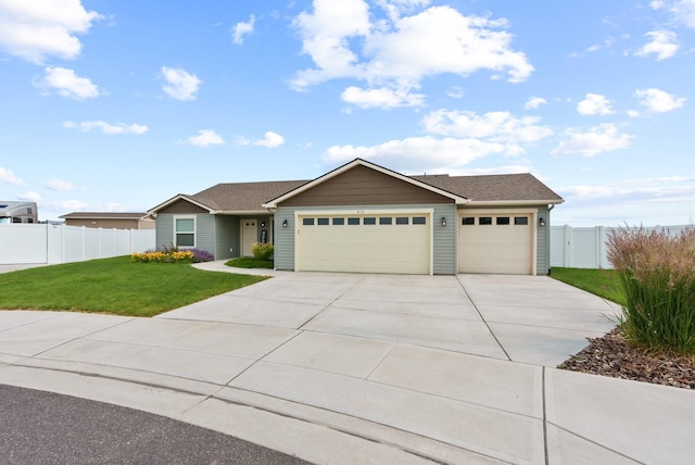 818 S Apple Pl, Spokane, WA 99224 - ranch-style home featuring a garage and concrete driveway