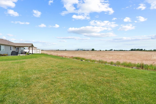 818 S Apple Pl, Spokane, WA 99224 - view of grassy yard with an outbuilding and a view of countryside