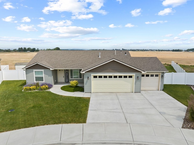 818 S Apple Pl, Spokane, WA 99224 - ranch-style house featuring driveway, an attached garage, and roof with shingles