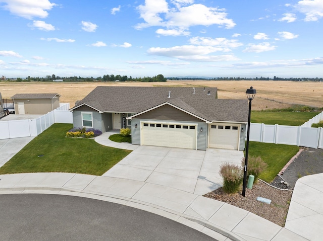 818 S Apple Pl, Spokane, WA 99224 - ranch-style house featuring an attached garage, concrete driveway, and roof with shingles