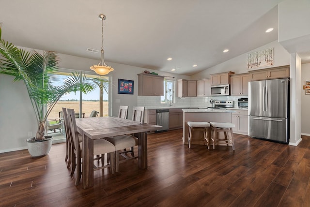 818 S Apple Pl, Spokane, WA 99224 - dining room with dark wood finished floors, recessed lighting, and vaulted ceiling