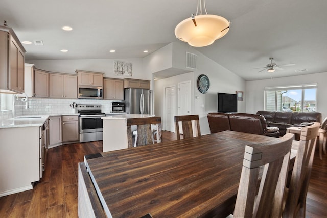 818 S Apple Pl, Spokane, WA 99224 - dining room featuring lofted ceiling, a ceiling fan, dark wood-style flooring, and recessed lighting