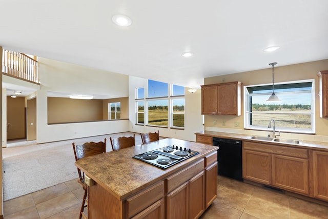 19915 S Ritchey Rd, Cheney, WA 99004 - kitchen featuring black appliances, light tile patterned floors, recessed lighting, pendant lighting, and a center island