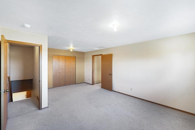 19915 S Ritchey Rd, Cheney, WA 99004 - unfurnished bedroom with light colored carpet and a closet