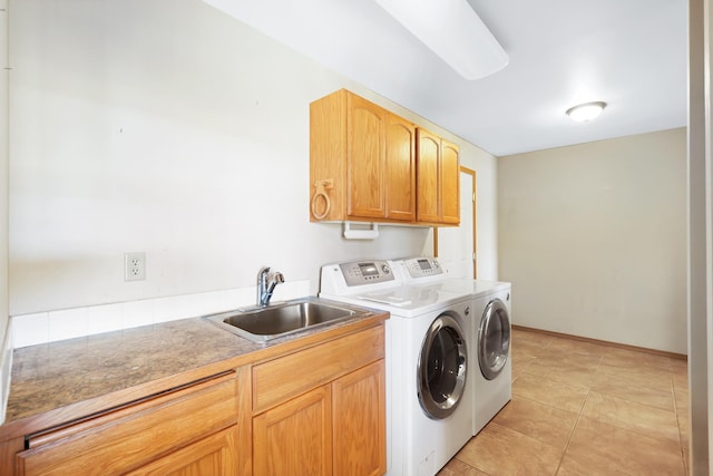 19915 S Ritchey Rd, Cheney, WA 99004 - washroom with washer and clothes dryer, cabinet space, and light tile patterned floors