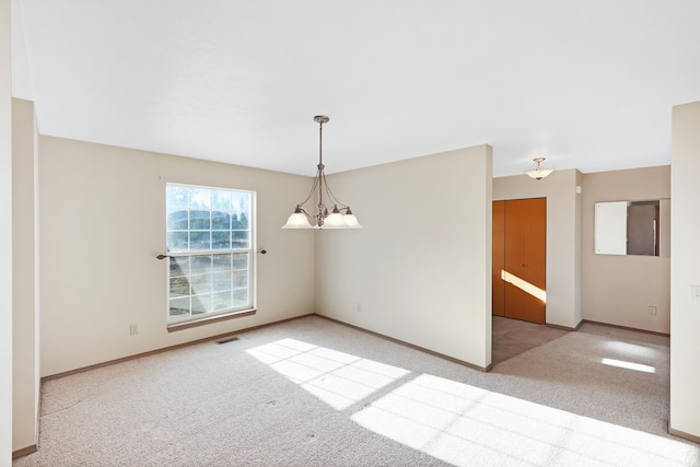 19915 S Ritchey Rd, Cheney, WA 99004 - empty room with carpet and a chandelier