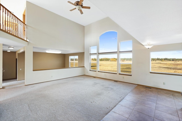 19915 S Ritchey Rd, Cheney, WA 99004 - carpeted spare room with high vaulted ceiling, ceiling fan, and tile patterned flooring