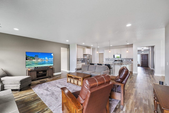 1418 S Cavalier St, Greenacres, WA 99016 - living room featuring dark wood-style floors and recessed lighting