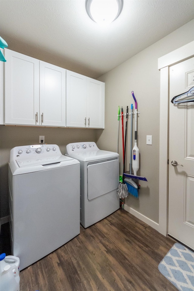 4017 E Hartson Ave, Spokane, WA 99202 - laundry area featuring cabinet space, independent washer and dryer, and dark wood-type flooring