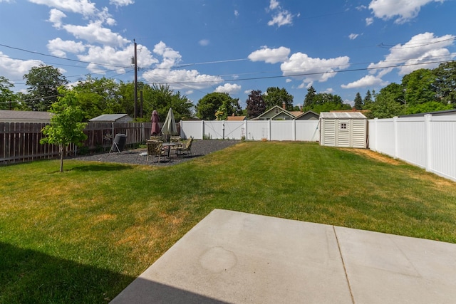 4017 E Hartson Ave, Spokane, WA 99202 - fenced backyard featuring a patio area and a storage shed