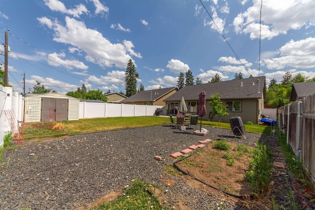 4017 E Hartson Ave, Spokane, WA 99202 - fenced backyard featuring a storage shed