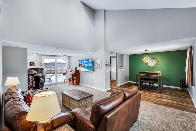 2202 E 50th Ave, Spokane, WA 99223 - living room featuring wood finished floors, carpet, and a high ceiling