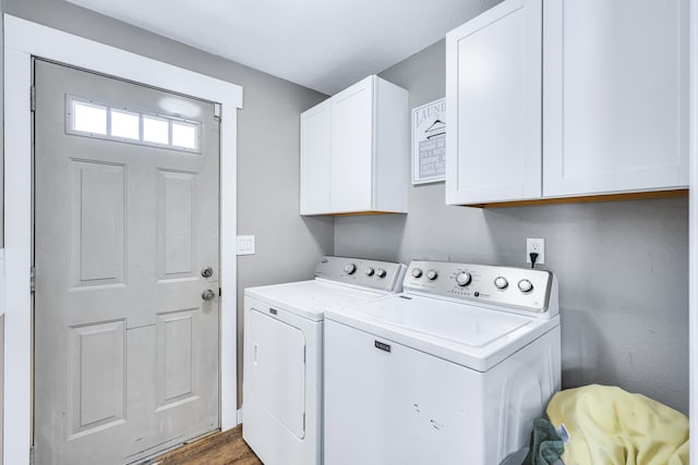 2202 E 50th Ave, Spokane, WA 99223 - laundry room with independent washer and dryer, cabinet space, and wood finished floors