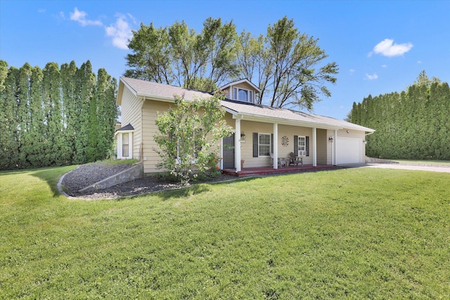 2202 E 50th Ave, Spokane, WA 99223 - view of front of house featuring an attached garage, concrete driveway, covered porch, and a front yard