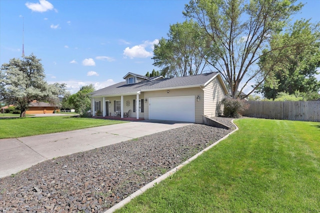 2202 E 50th Ave, Spokane, WA 99223 - view of front facade featuring a garage, covered porch, and driveway