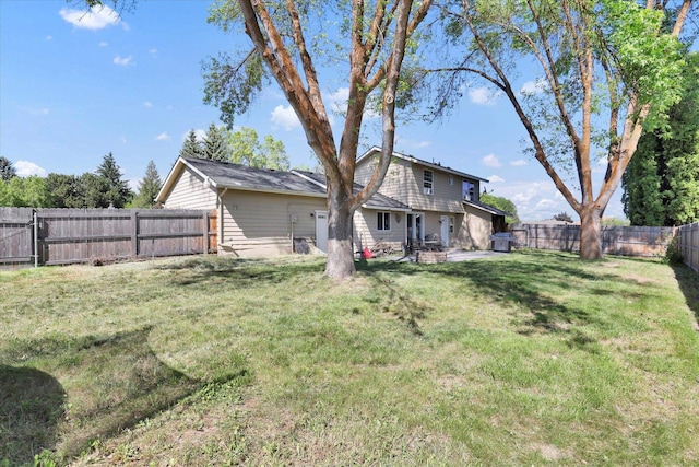 2202 E 50th Ave, Spokane, WA 99223 - fenced backyard with a patio area