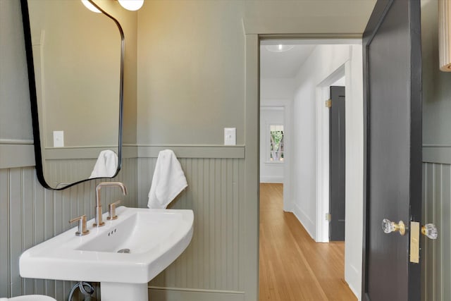 1111 W 23rd Ave, Spokane, WA 99203 - half bath with wood finished floors and a sink