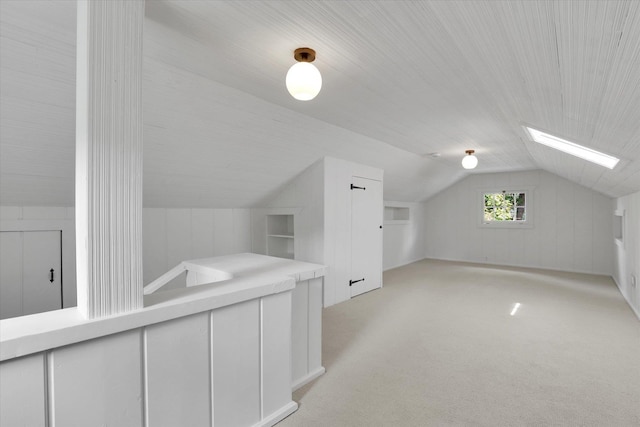 1111 W 23rd Ave, Spokane, WA 99203 - additional living space with lofted ceiling, a skylight, and light carpet