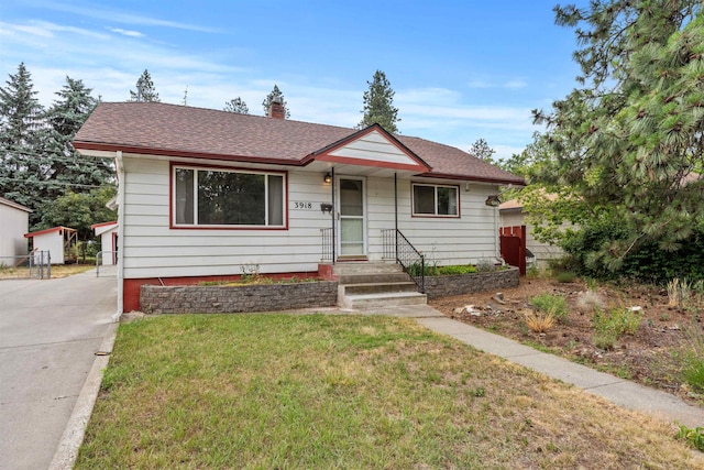 3918 E 8th Ave, Spokane, WA 99202 - bungalow with a chimney and roof with shingles