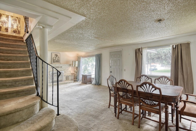 6423 N Washington St, Spokane, WA 99208 - dining room with a textured ceiling, carpet, and stairs