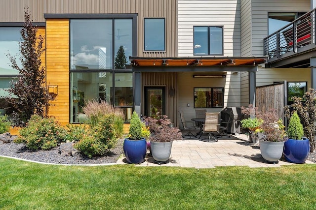 4408 E 23rd Ln, Spokane, WA 99223 - back of property with a patio and a balcony