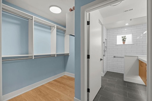 4408 E 23rd Ln, Spokane, WA 99223 - bathroom featuring vanity and a tile shower