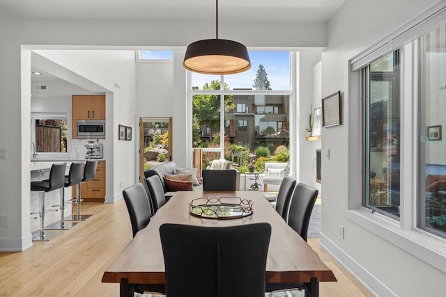 4408 E 23rd Ln, Spokane, WA 99223 - dining room with light wood-style flooring and baseboards