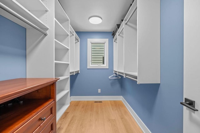 4408 E 23rd Ln, Spokane, WA 99223 - walk in closet featuring light wood-style floors