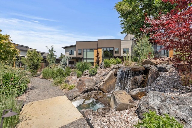4408 E 23rd Ln, Spokane, WA 99223 - surrounding community featuring a garden pond