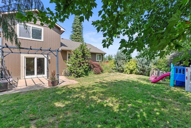 3224 E 42nd Ave, Spokane, WA 99223 - view of grassy yard with a pergola, a playground, and a patio area