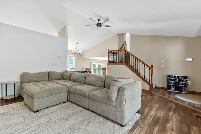3224 E 42nd Ave, Spokane, WA 99223 - living room with wood finished floors, stairs, a ceiling fan, a chandelier, and high vaulted ceiling