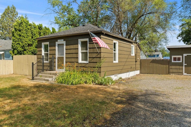 8007 E Euclid Ave, Spokane, WA 99212 - view of front facade with driveway and roof with shingles