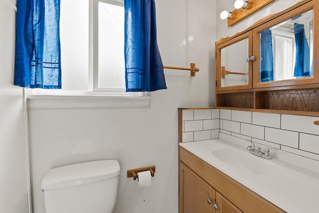 8007 E Euclid Ave, Spokane, WA 99212 - bathroom featuring vanity and decorative backsplash