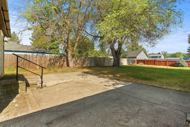 8007 E Euclid Ave, Spokane, WA 99212 - fenced backyard with a patio