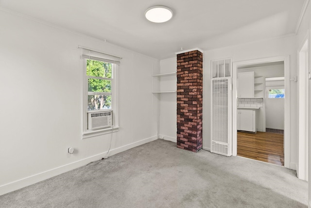 8007 E Euclid Ave, Spokane, WA 99212 - unfurnished bedroom with a heating unit, multiple windows, carpet floors, crown molding, and cooling unit