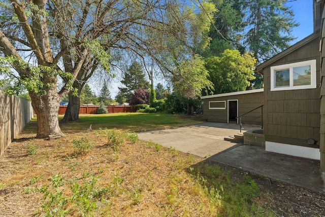 8007 E Euclid Ave, Spokane, WA 99212 - fenced backyard featuring a patio area