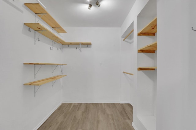 2019 S Saint Charles Rd, Veradale, WA 99037 - walk in closet with wood finished floors