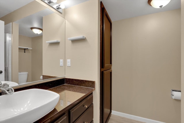 2019 S Saint Charles Rd, Veradale, WA 99037 - bathroom with vanity and wood finished floors