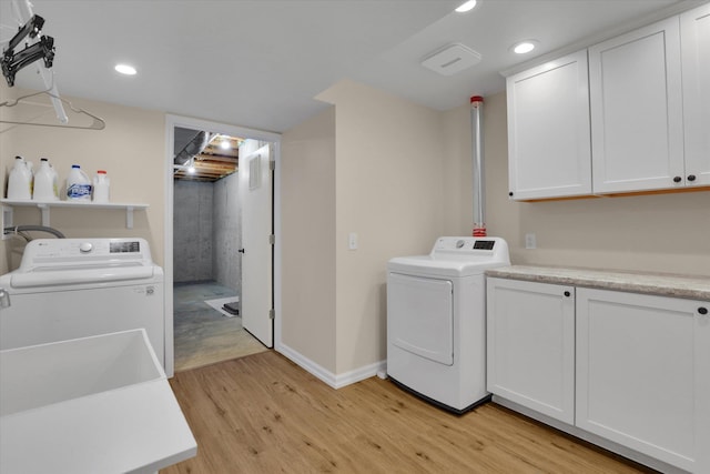 2019 S Saint Charles Rd, Veradale, WA 99037 - laundry room with independent washer and dryer, light wood-type flooring, recessed lighting, and cabinet space