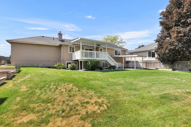 2019 S Saint Charles Rd, Veradale, WA 99037 - rear view of property featuring stairway, a deck, and a chimney
