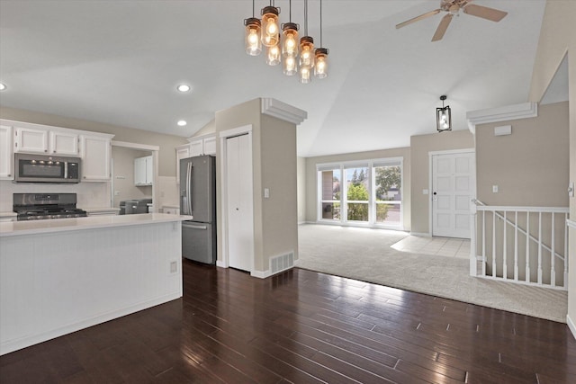 2019 S Saint Charles Rd, Veradale, WA 99037 - kitchen featuring appliances with stainless steel finishes, open floor plan, light countertops, white cabinetry, and a ceiling fan