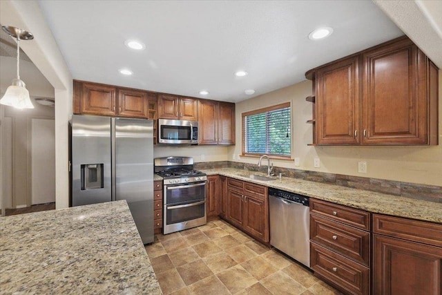 1707 S Early Dawn Dr, Spokane Valley, WA 99037 - kitchen featuring appliances with stainless steel finishes, open shelves, recessed lighting, light stone countertops, and hanging light fixtures