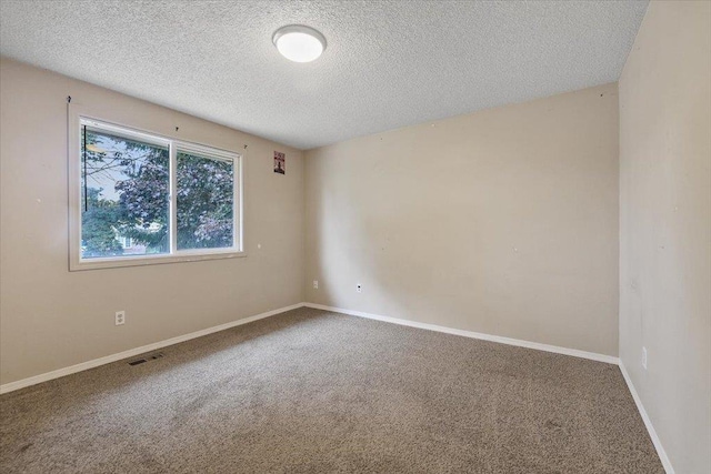 1707 S Early Dawn Dr, Spokane Valley, WA 99037 - empty room with a textured ceiling and carpet floors