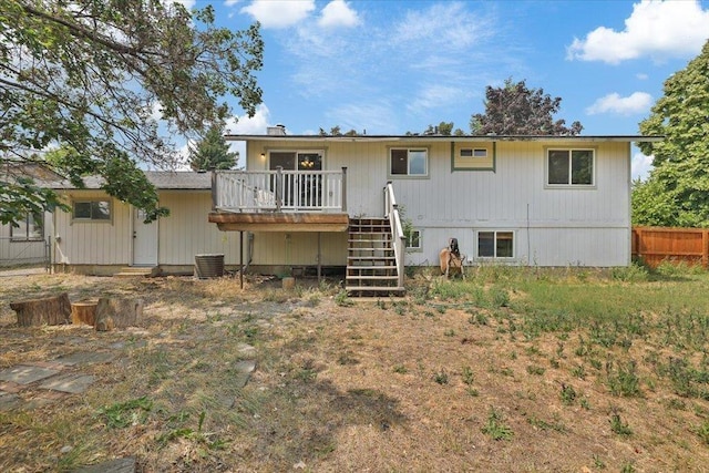1707 S Early Dawn Dr, Spokane Valley, WA 99037 - back of property with stairs and a wooden deck