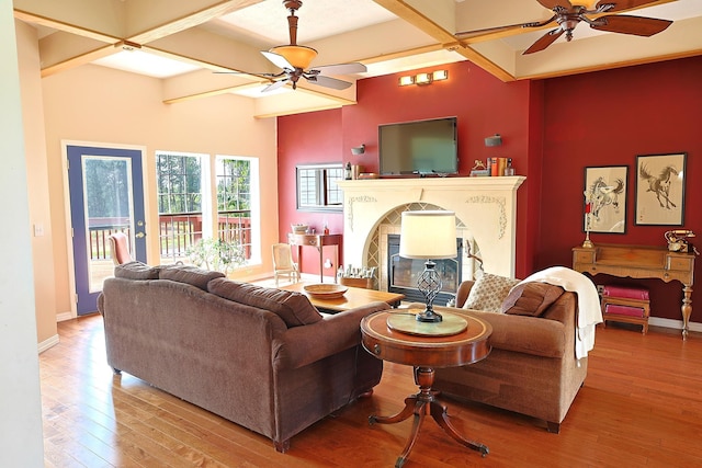 16303 S Cheney-Spokane Rd, Cheney, WA 99004 - living room with a ceiling fan, wood-type flooring, a fireplace, and beam ceiling