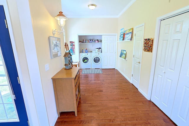16303 S Cheney-Spokane Rd, Cheney, WA 99004 - hall with crown molding, washer and clothes dryer, and dark wood finished floors