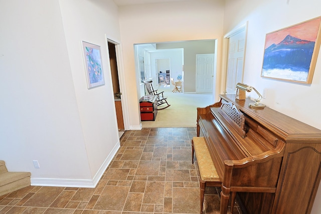 16303 S Cheney-Spokane Rd, Cheney, WA 99004 - hallway featuring stone finish floors and stairs